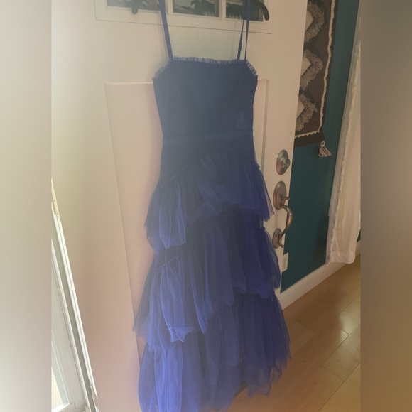 It is made of a mesh material, it is see through on the stomach only, blue dress - Picture 6 of 10